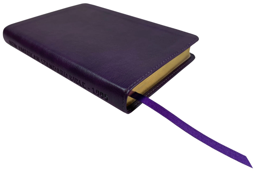 NASB 1995 Compact Text Bible, purple leathertex, angled side view with ribbon marker