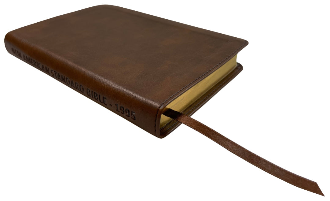 NASB 1995 Compact Text Bible, brown leathertex, angled side view with ribbon marker