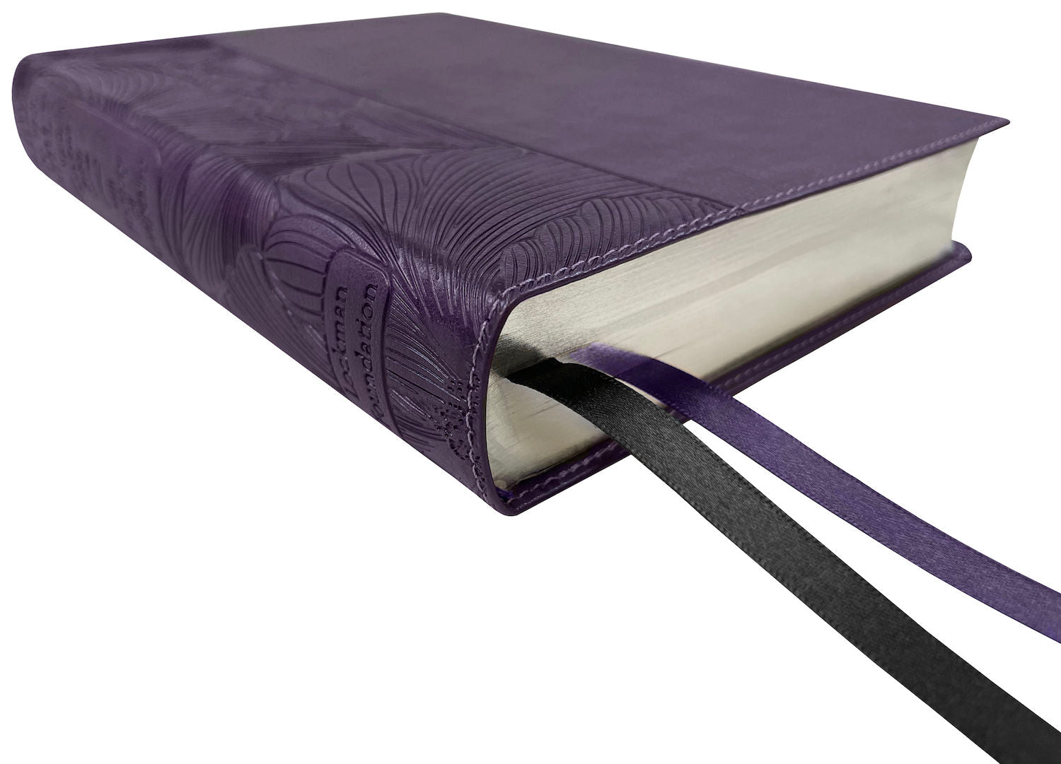 NASB 2020 Beauty of Scripture Bible, purple leathertex cover with special floral design, angled side view with ribbon markers
