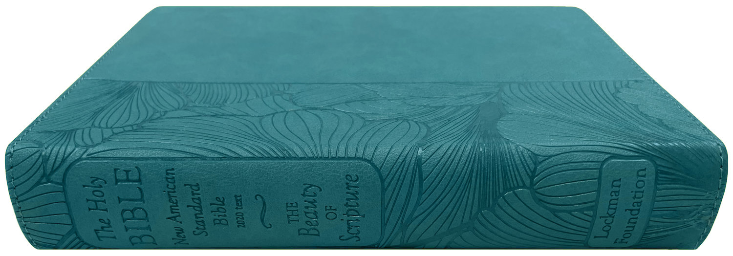 NASB 2020 Beauty of Scripture Bible, teal leathertex cover with special floral design, angled side view